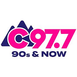 C97.7